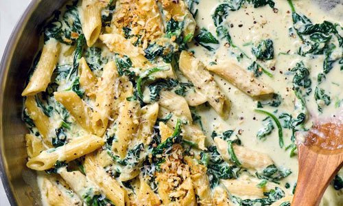 A freshly prepared dish of Spinach Cream Pasta